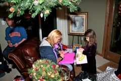 Tracy helps Kiley with her gifts